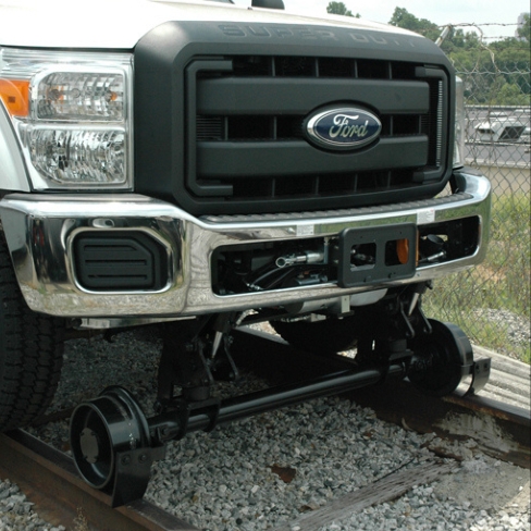 Ford work truck modified to drive on railroad tracks